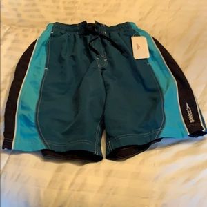 Men’s speedo bathing suit trunks in size medium.